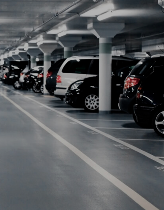 Rows of parked cars in a multi storey car park
