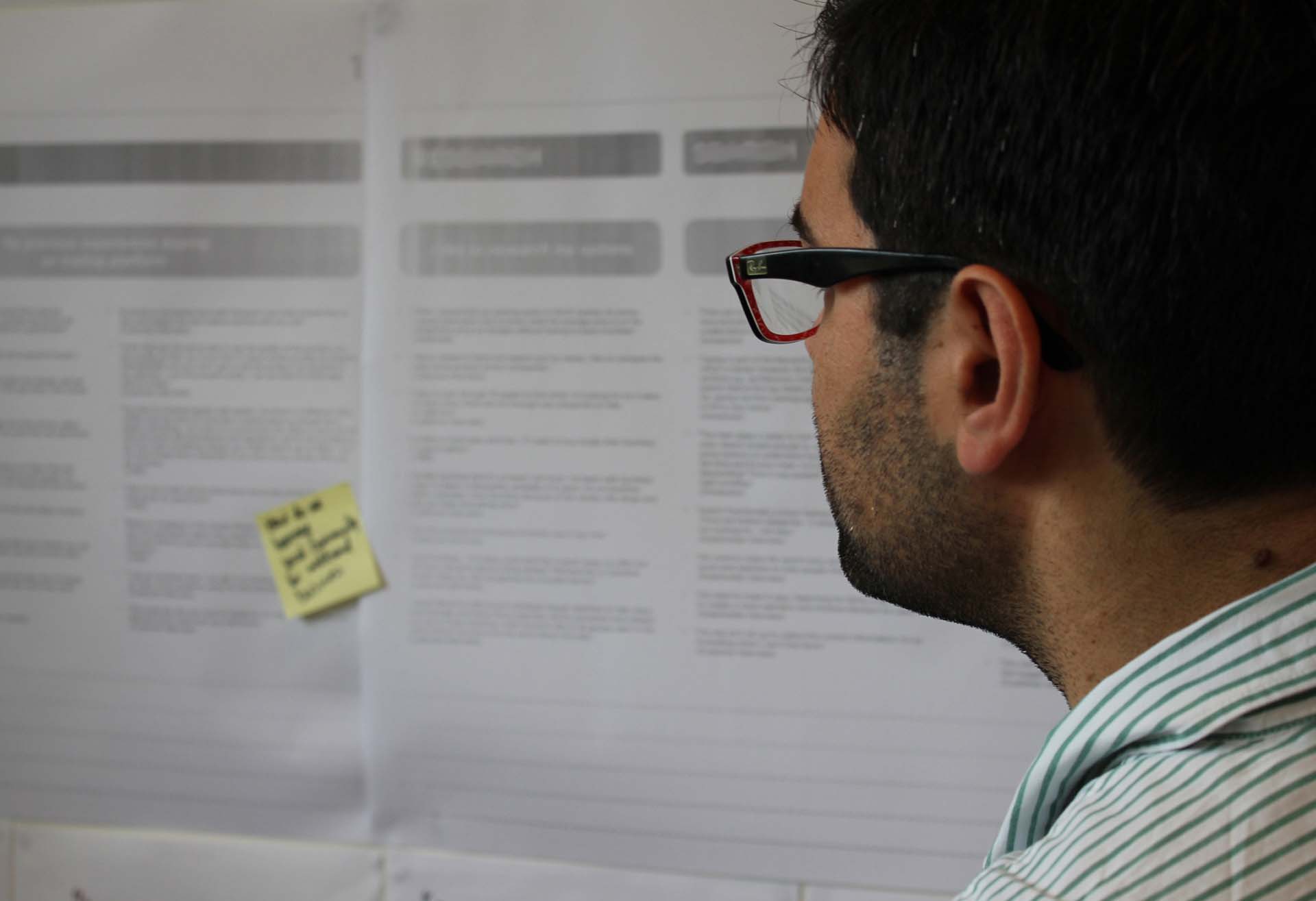 Man looking at a customer journey map