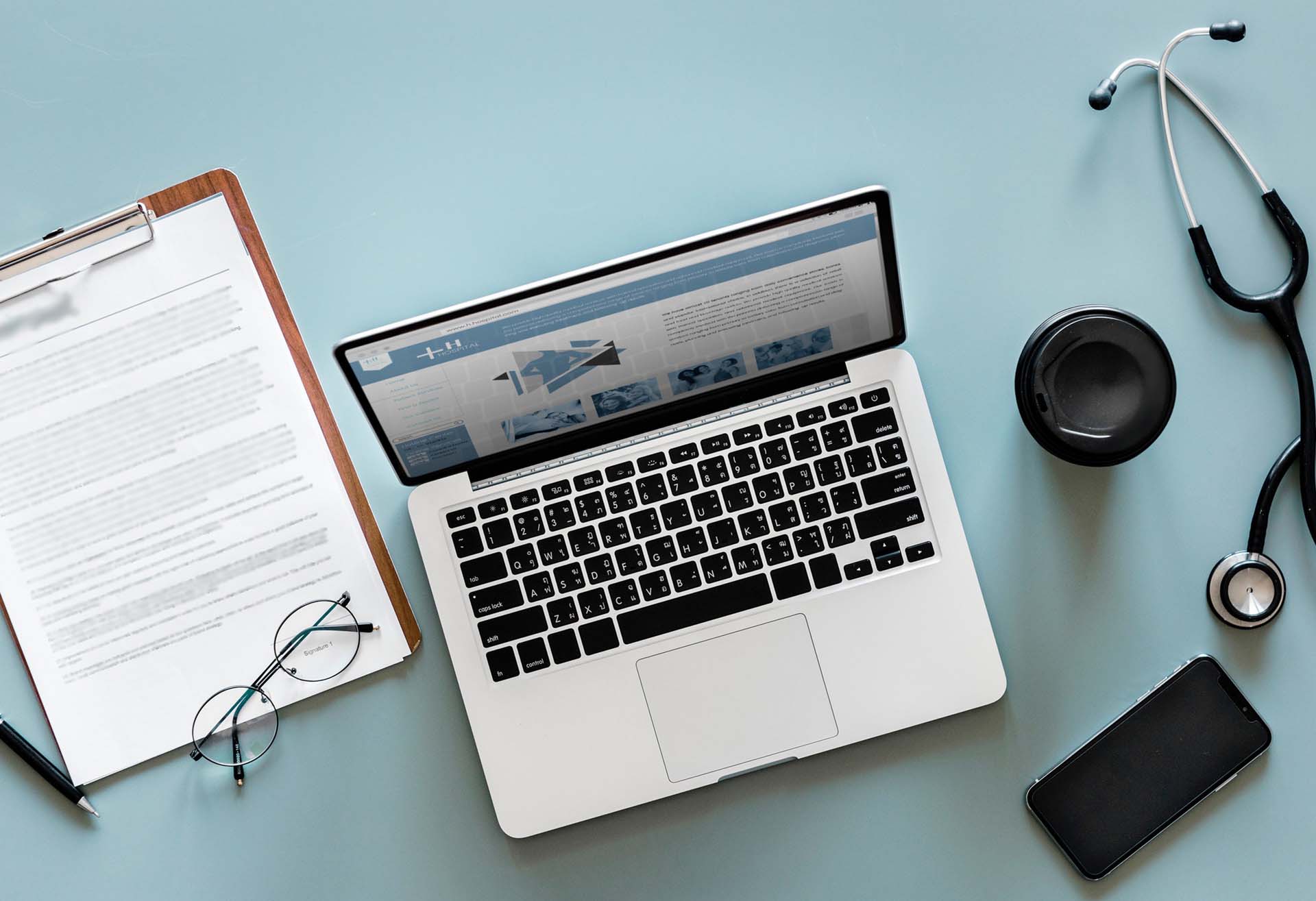 Overhead image of a doctors desk representing Health & Service Design