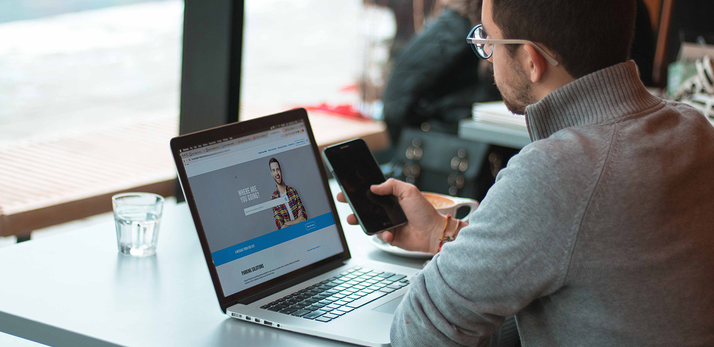 Man using parking website