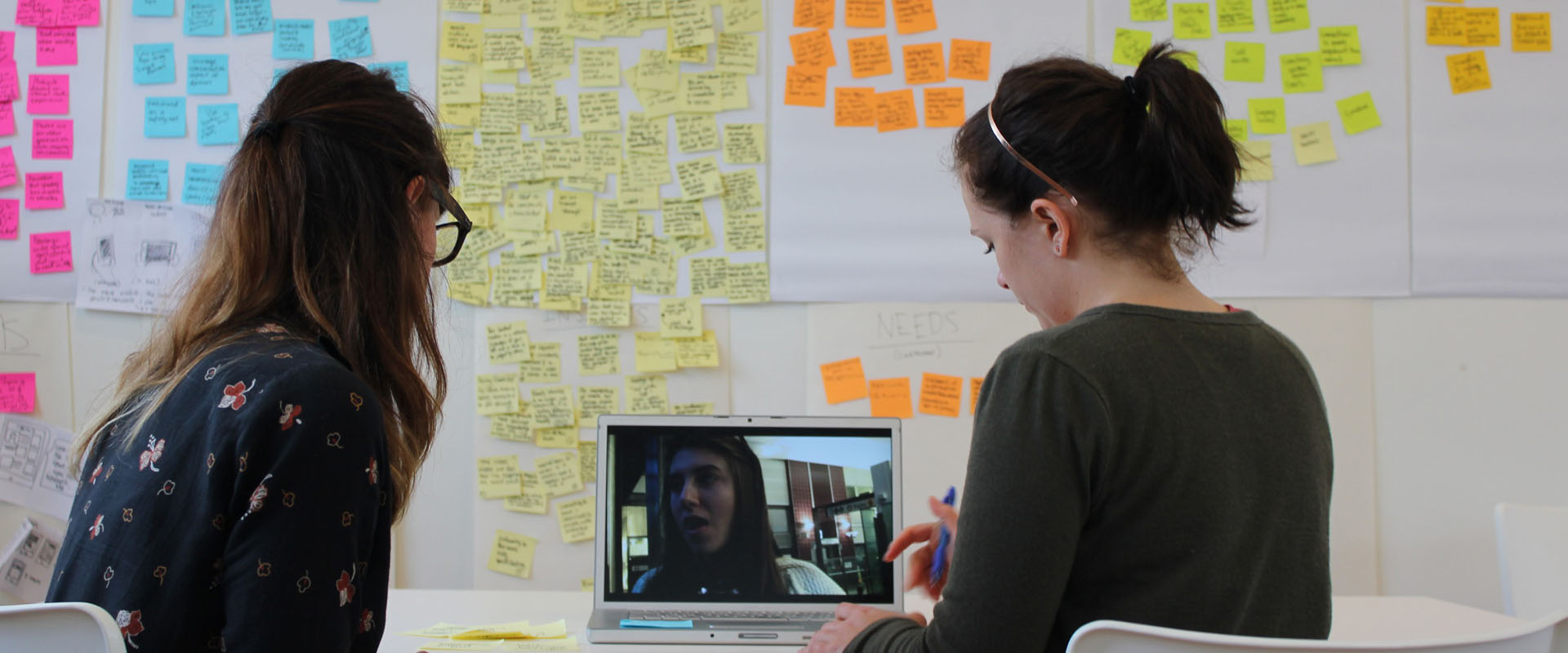 Two Proto employees conducting a video interview