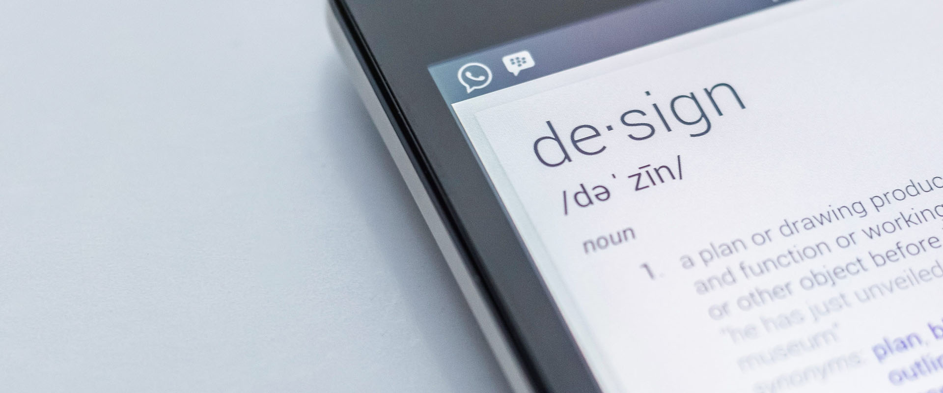 Phone screen displaying the definition of design
