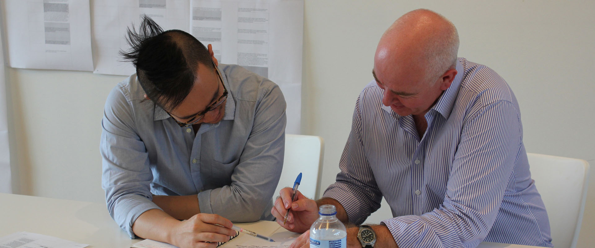 Two Proto employees having a Service Design meeting