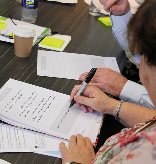 Woman filling out customer research form